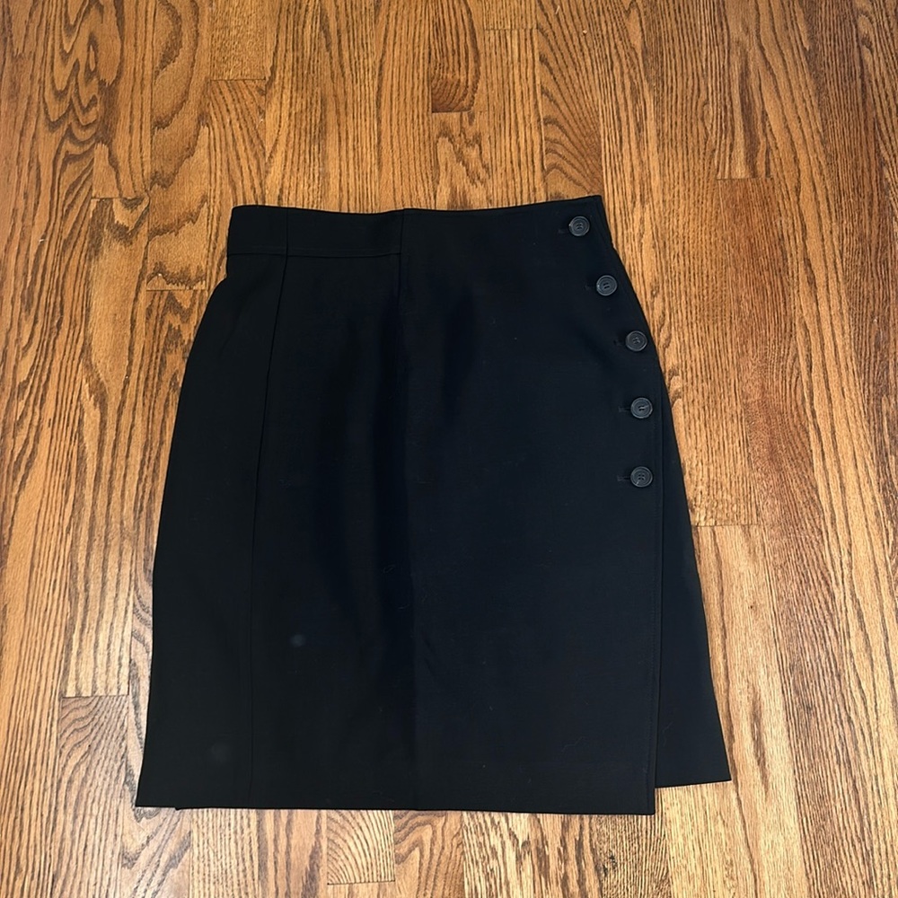 Akris black tropical wool skirt below the knee